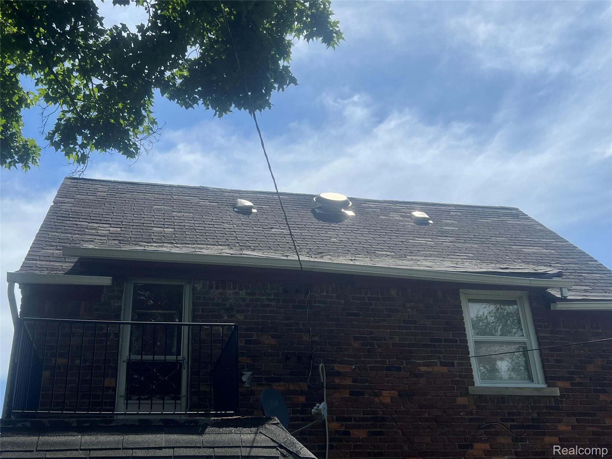 17311 Santa Rosa Drive Detroit, MI 48221 - Photo 13 of 89 Brick exterior with a dark asphalt shingle roof