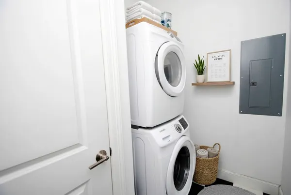 a utility room with dryer and washer
