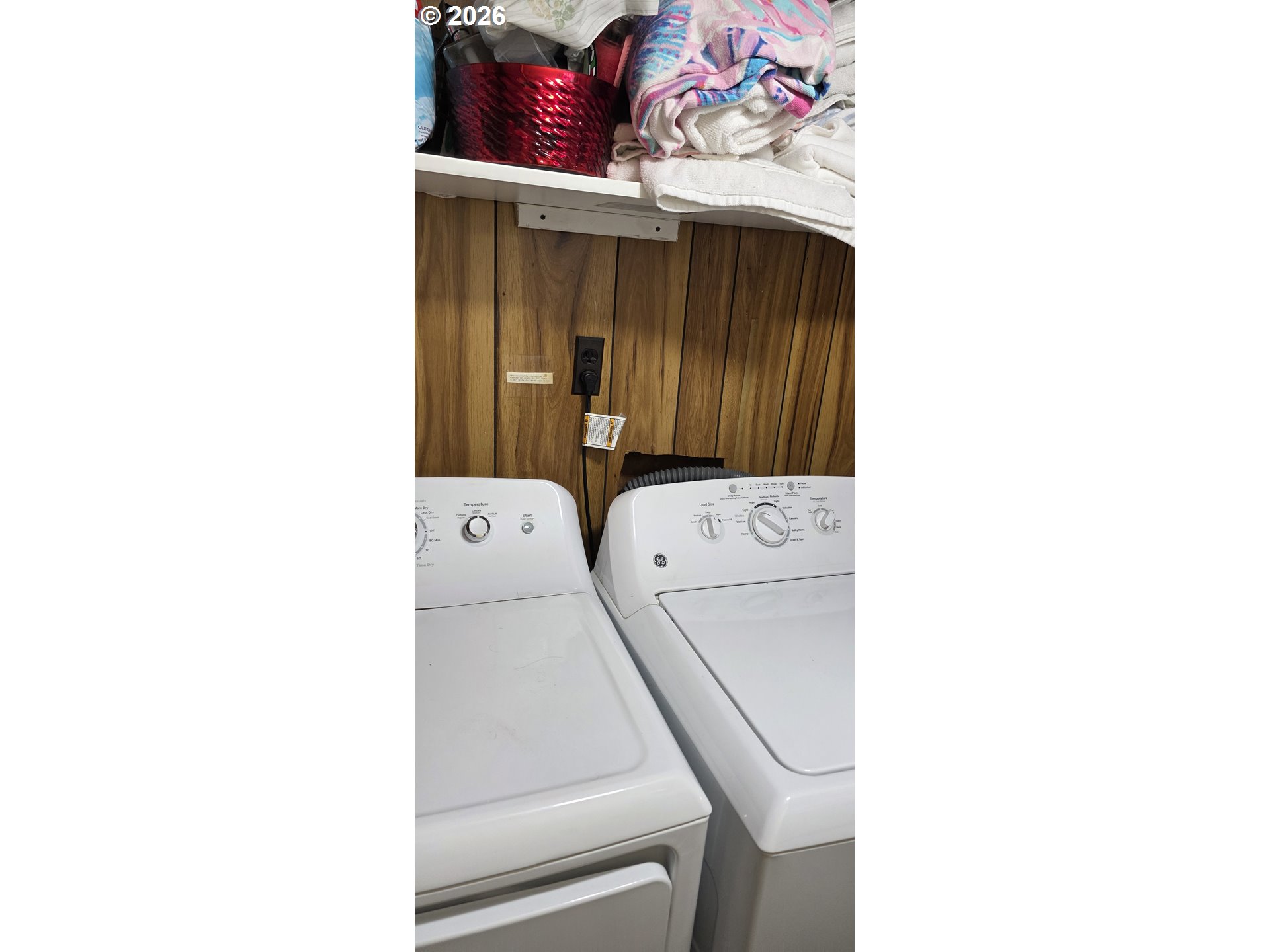5335 Main Street, Unit 154 Springfield, OR 97478 - Photo 11 of 12 a utility room with dryer and washer