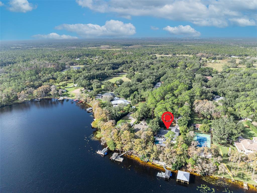 4733 Chuluota Road Orlando, FL 32820 - Photo 44 of 46 an aerial view of residential house with outdoor space and lake view
