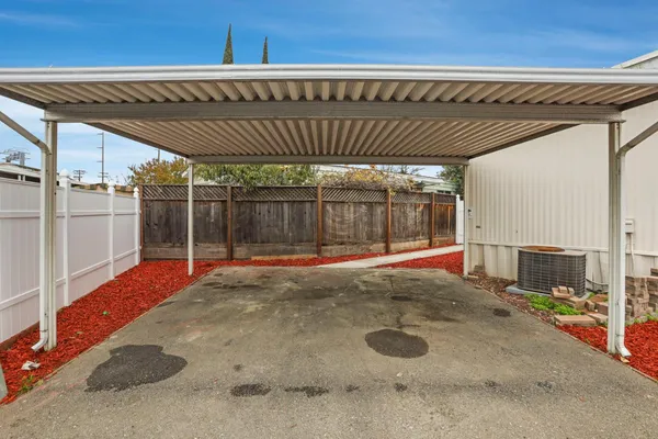 a view of backyard with door