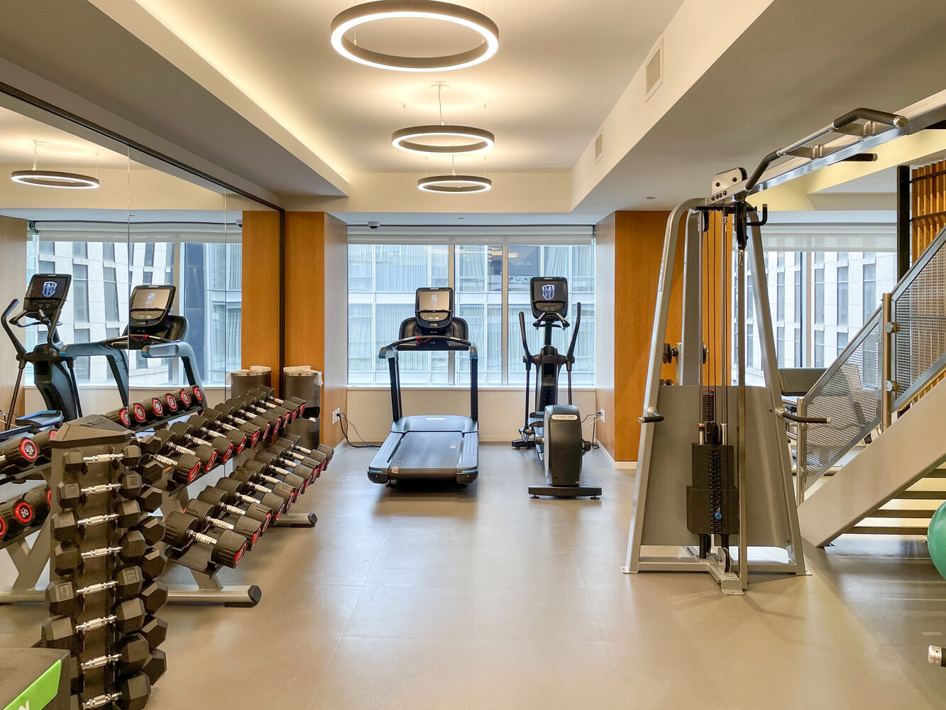 15 West 53rd Street, Unit 46AF Manhattan, NY 10019 - Photo 15 of 17 a view of a room with gym equipment