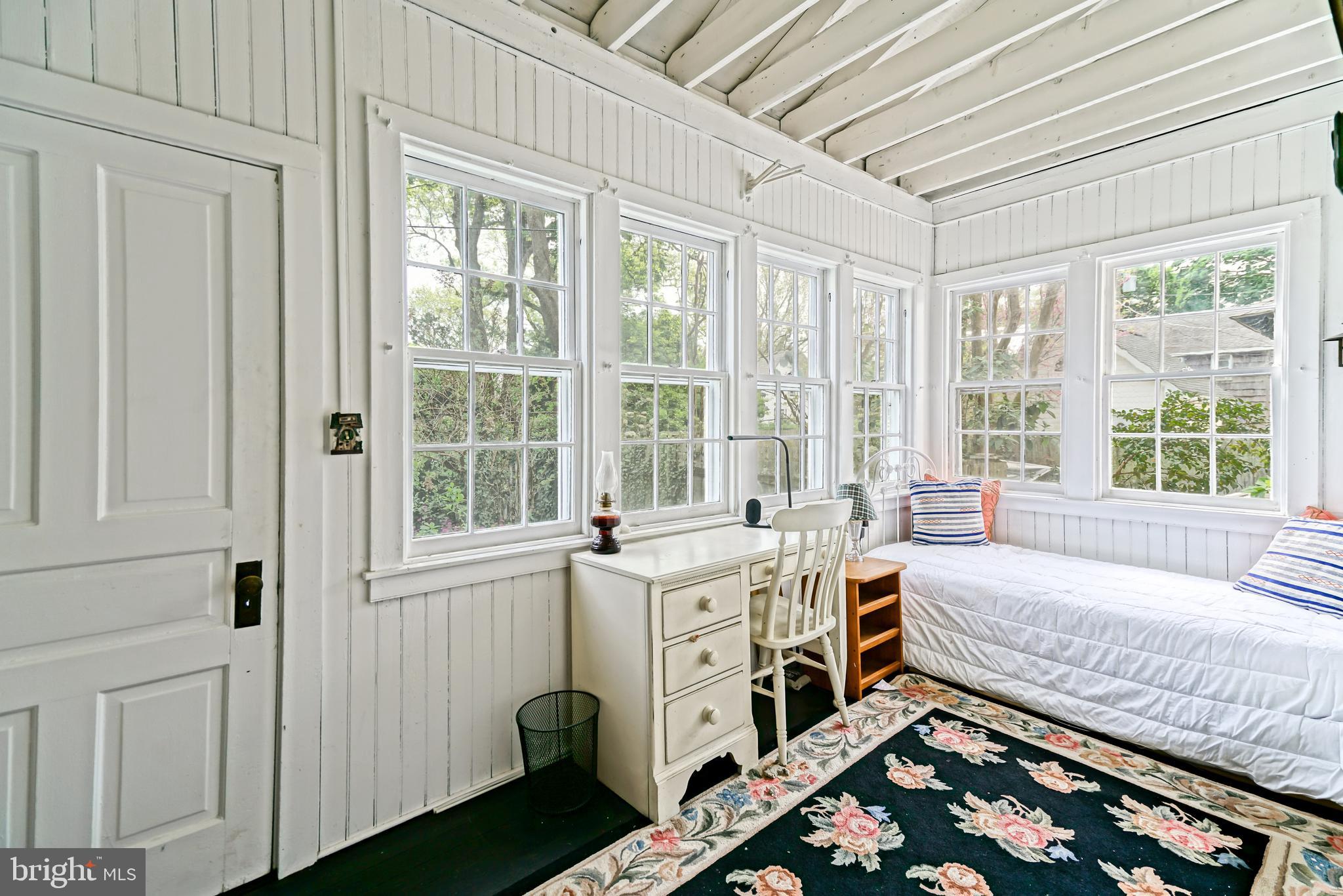 407 Savannah Road Lewes, DE 19958 - Photo 22 of 44 a bed room with a bed and a window