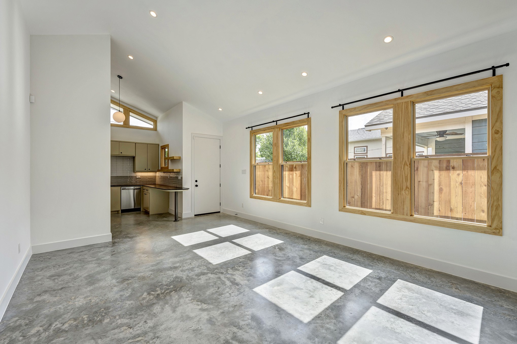 907 Kern Street, Unit A Houston, TX 77009 - Photo 3 of 18 Once inside you are greeted by concrete floors, 14 foot vaulted ceiling and great natural light.