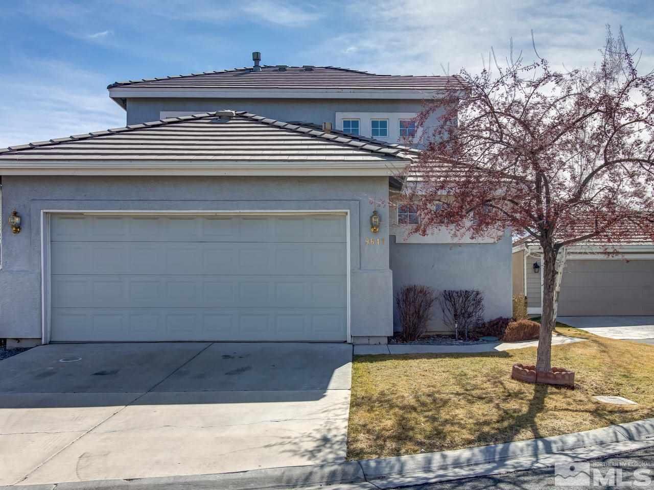 9647 Truckee Meadows Place Reno, NV 89521 - Photo 1 of 25 a view of a house with a yard