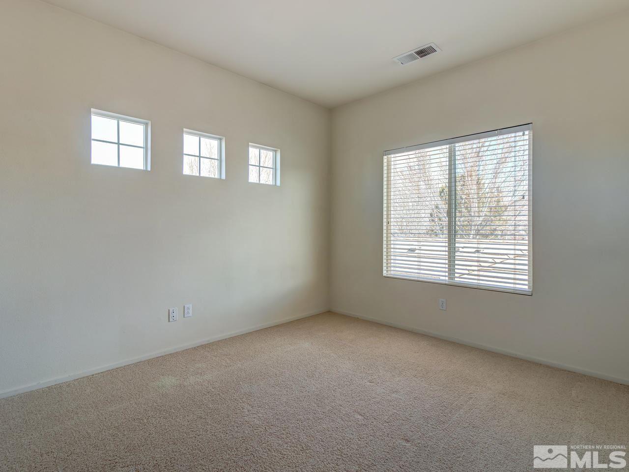 9647 Truckee Meadows Place Reno, NV 89521 - Photo 17 of 25 a view of an empty room with a window