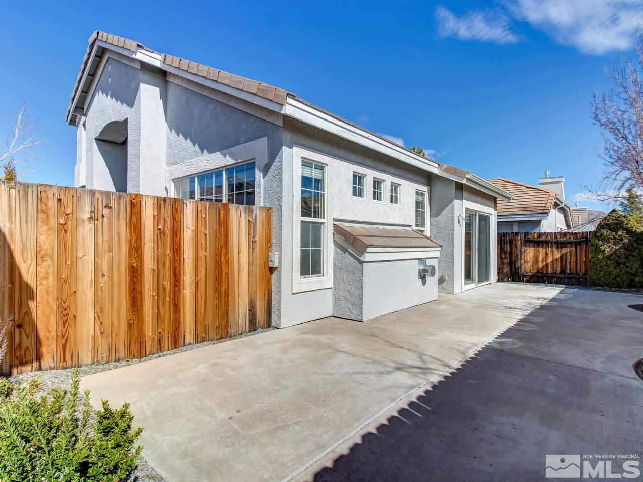 9647 Truckee Meadows Place Reno, NV 89521 - Photo 25 of 25 a front view of a house with a yard