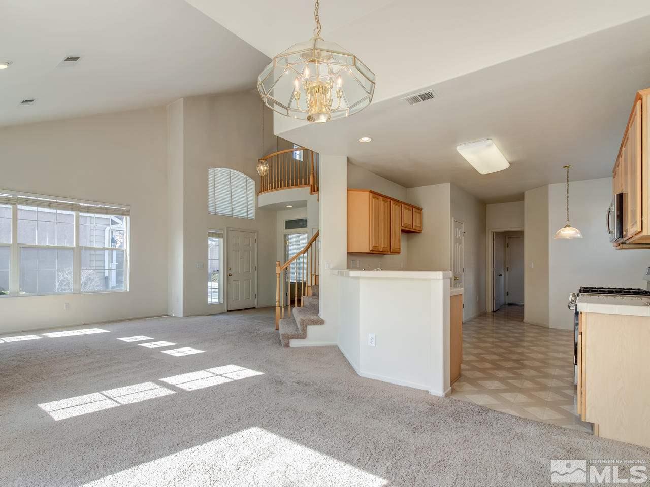 9647 Truckee Meadows Place Reno, NV 89521 - Photo 9 of 25 a view of a kitchen and a kitchen
