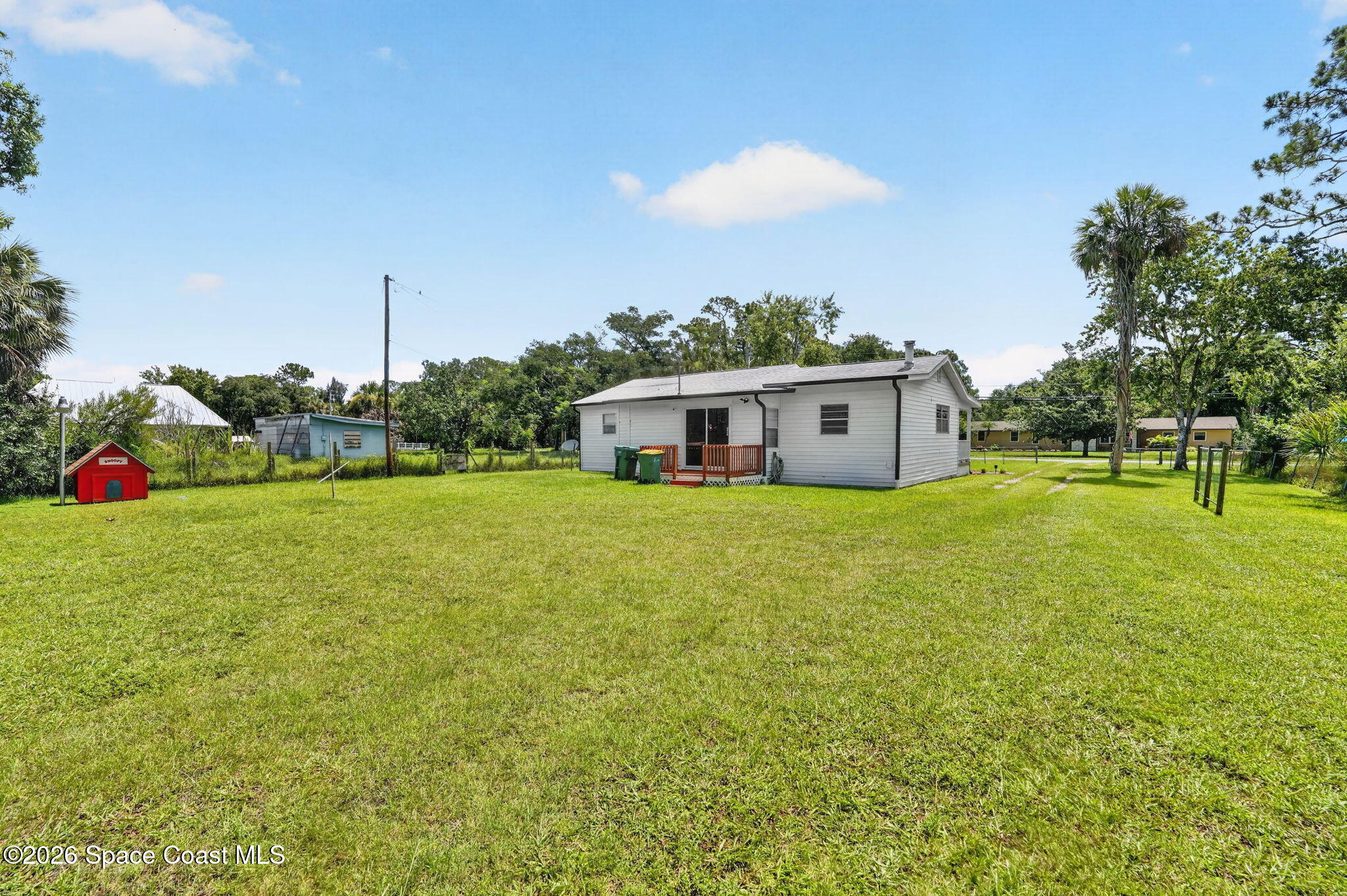 1944 Harlock Road Melbourne, FL 32934 - Photo 45 of 52 Backyard Facing the back of the house