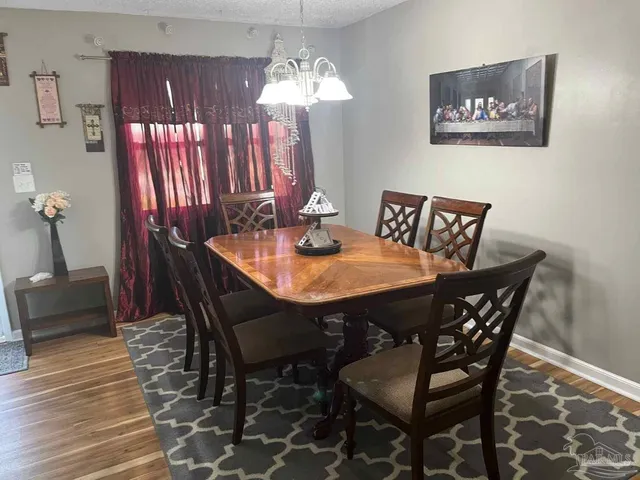 a refrigerator freezer sitting inside of a kitchen