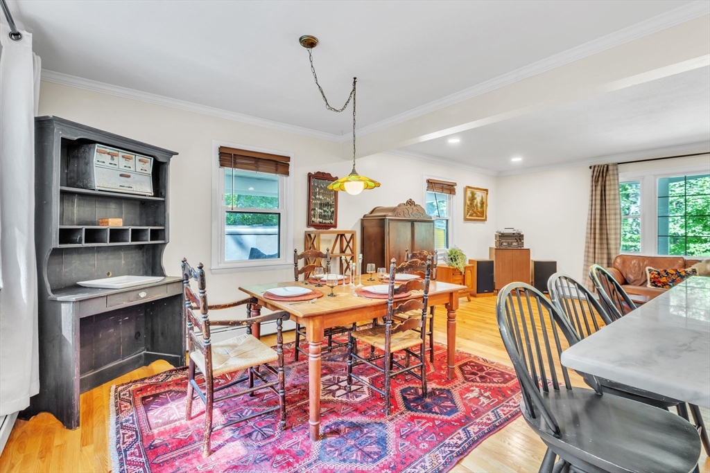 4 Colonial Road Sutton, MA 01590 - Photo 13 of 38 a view of a dining room with furniture