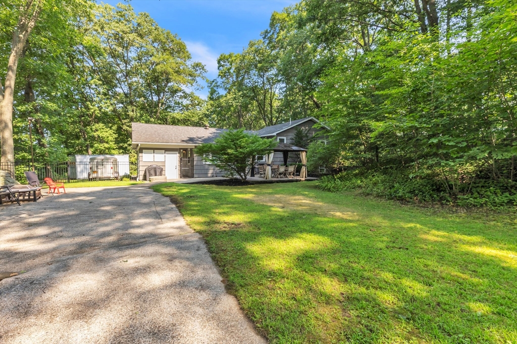 4 Colonial Road Sutton, MA 01590 - Photo 37 of 38 a view of house with yard
