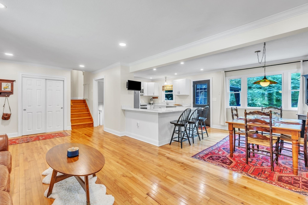 4 Colonial Road Sutton, MA 01590 - Photo 8 of 38 a living room with furniture and a wooden floor