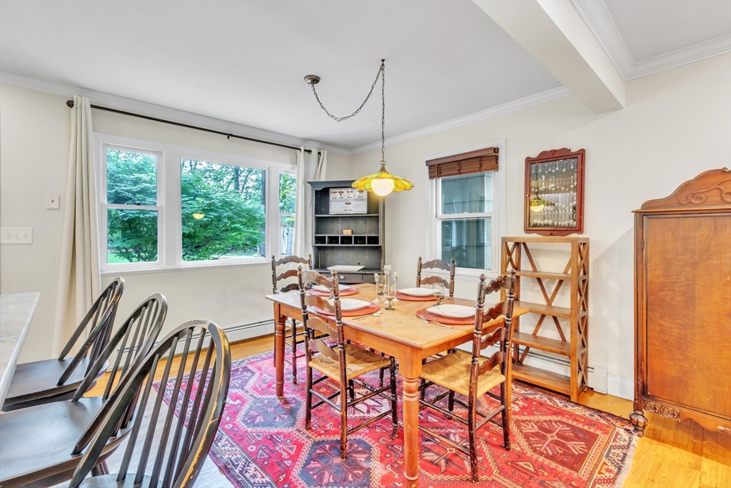 4 Colonial Road Sutton, MA 01590 - Photo 10 of 38 a view of a dining room with furniture window and outside view