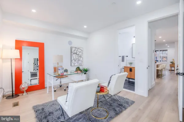 a living room with furniture and window