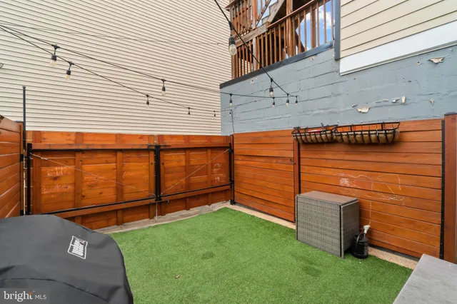 a view of a backyard with a garden