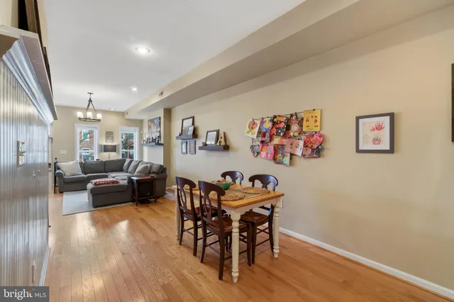 a view of a livingroom with furniture and wooden floor