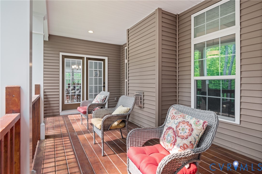 1012 Water Beech Road Midlothian, VA 23114 - Photo 18 of 47 a balcony with furniture and wooden floor