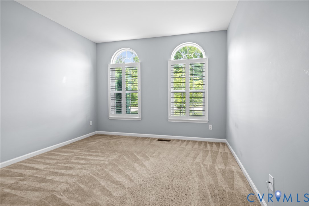 1012 Water Beech Road Midlothian, VA 23114 - Photo 25 of 47 a view of an empty room with a window