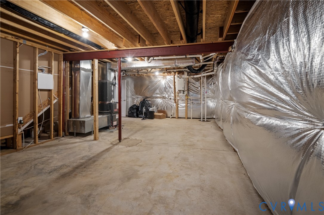 1012 Water Beech Road Midlothian, VA 23114 - Photo 34 of 47 a view of an empty room with wooden floor