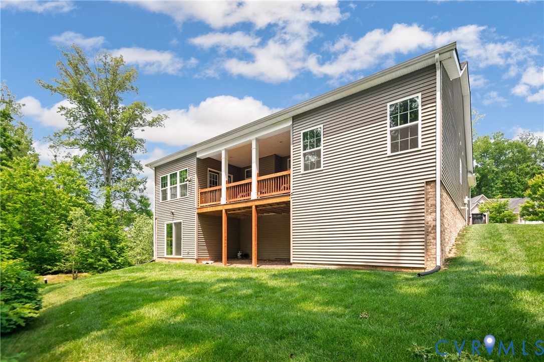 1012 Water Beech Road Midlothian, VA 23114 - Photo 35 of 47 a front view of a house with a yard