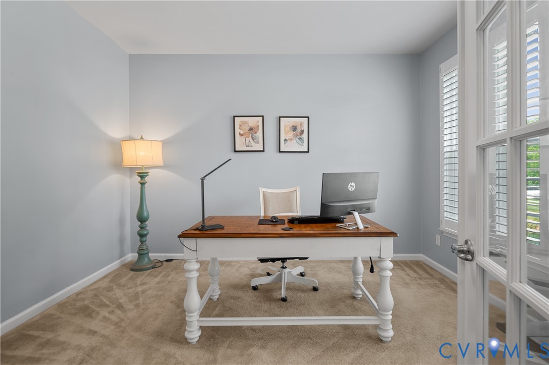 1012 Water Beech Road Midlothian, VA 23114 - Photo 5 of 47 a view of a workspace with furniture and a window