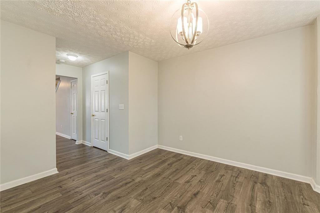 3151 Kingswood Glen Decatur, GA 30034 - Photo 17 of 38 a view of empty room with wooden floor