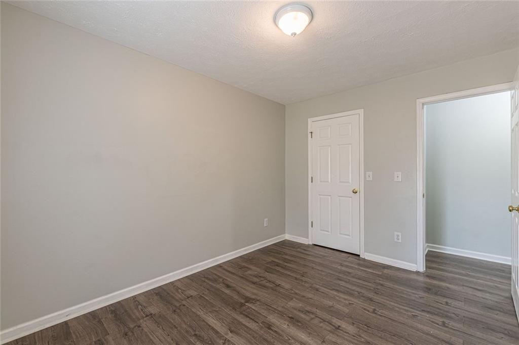 3151 Kingswood Glen Decatur, GA 30034 - Photo 27 of 38 a view of an empty room with wooden floor