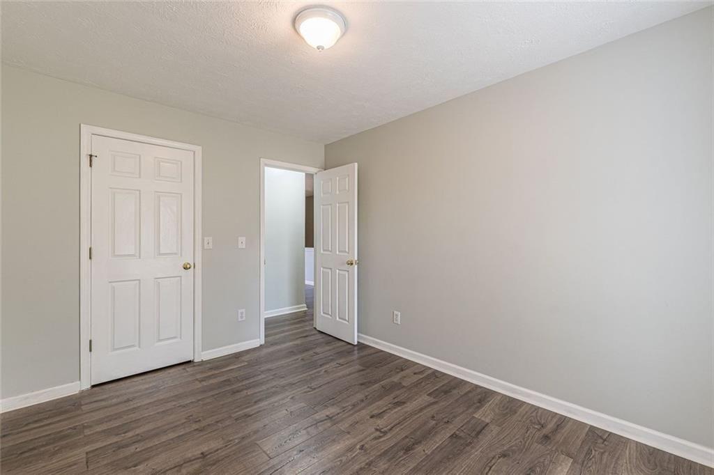 3151 Kingswood Glen Decatur, GA 30034 - Photo 28 of 38 a view of an empty room with wooden floor