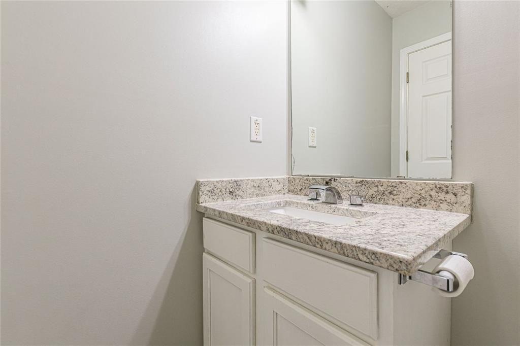 3151 Kingswood Glen Decatur, GA 30034 - Photo 29 of 38 a bathroom with a granite countertop sink and a mirror
