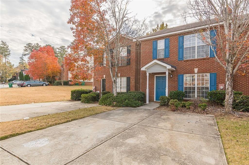 3151 Kingswood Glen Decatur, GA 30034 - Photo 3 of 38 a front view of a house with a yard and lake view