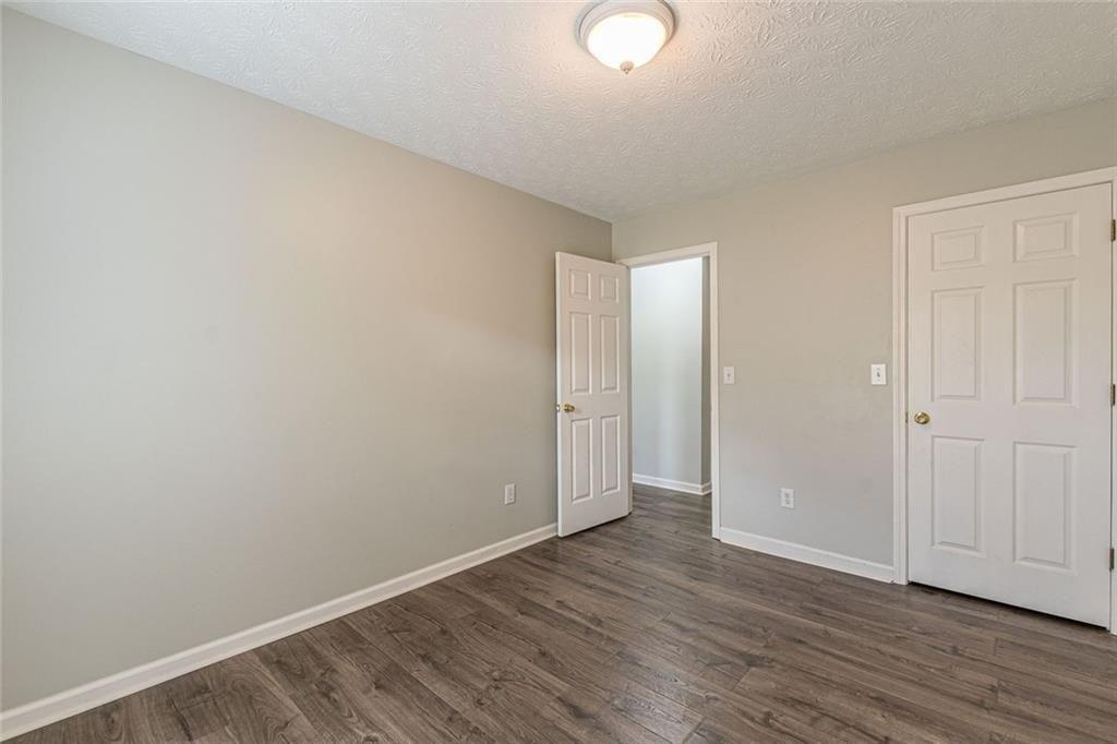 3151 Kingswood Glen Decatur, GA 30034 - Photo 32 of 38 a view of an empty room and wooden floor
