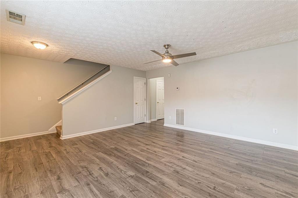 3151 Kingswood Glen Decatur, GA 30034 - Photo 6 of 38 a view of an empty room with wooden floor