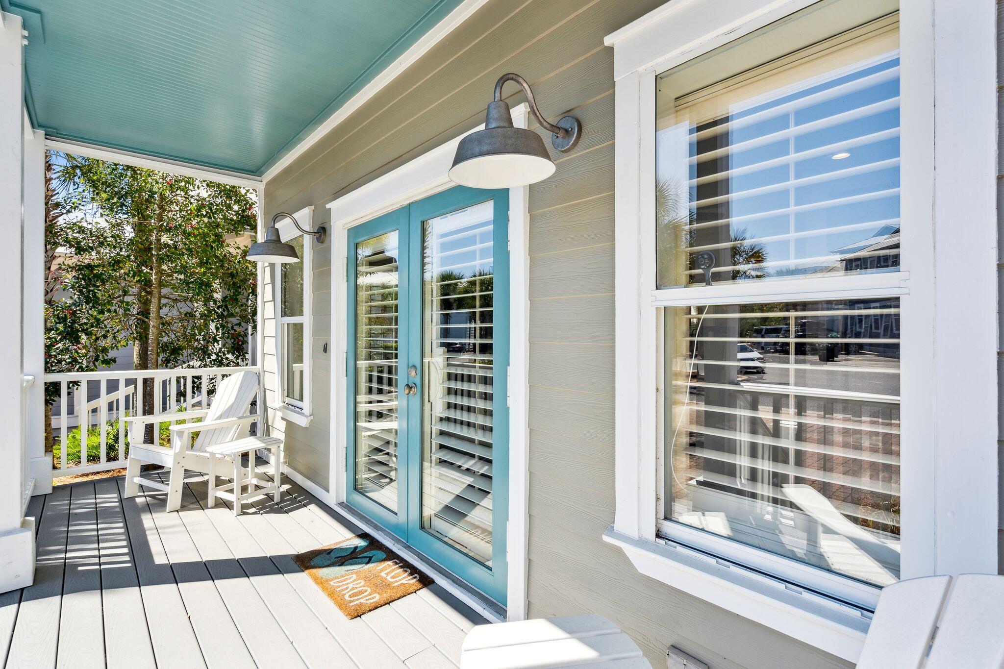 37 Beachcomber Lane Inlet Beach, FL 32461 - Photo 34 of 41 a view of a balcony with chairs and wooden floor