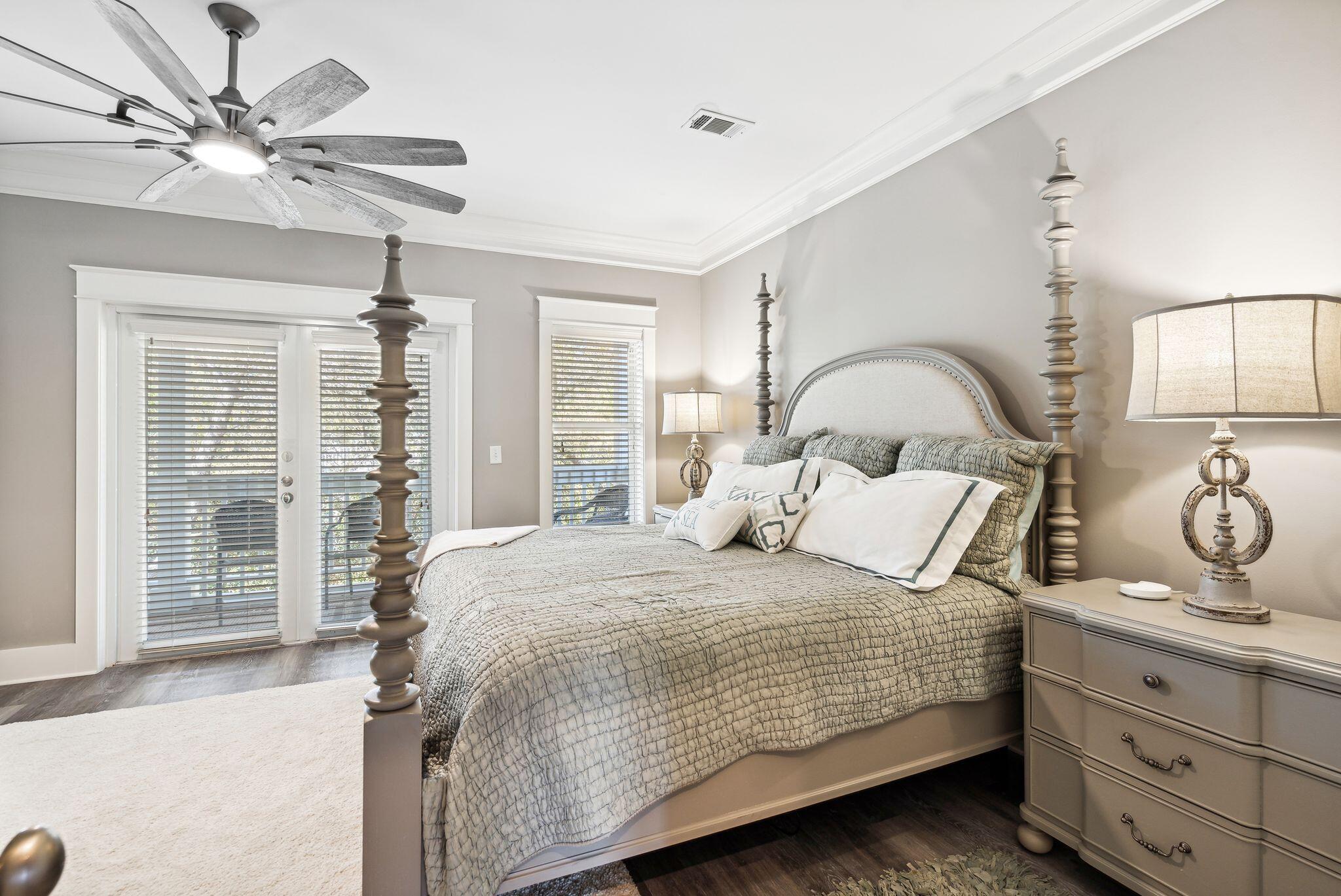 37 Beachcomber Lane Inlet Beach, FL 32461 - Photo 8 of 41 a bedroom with a large bed and a chandelier