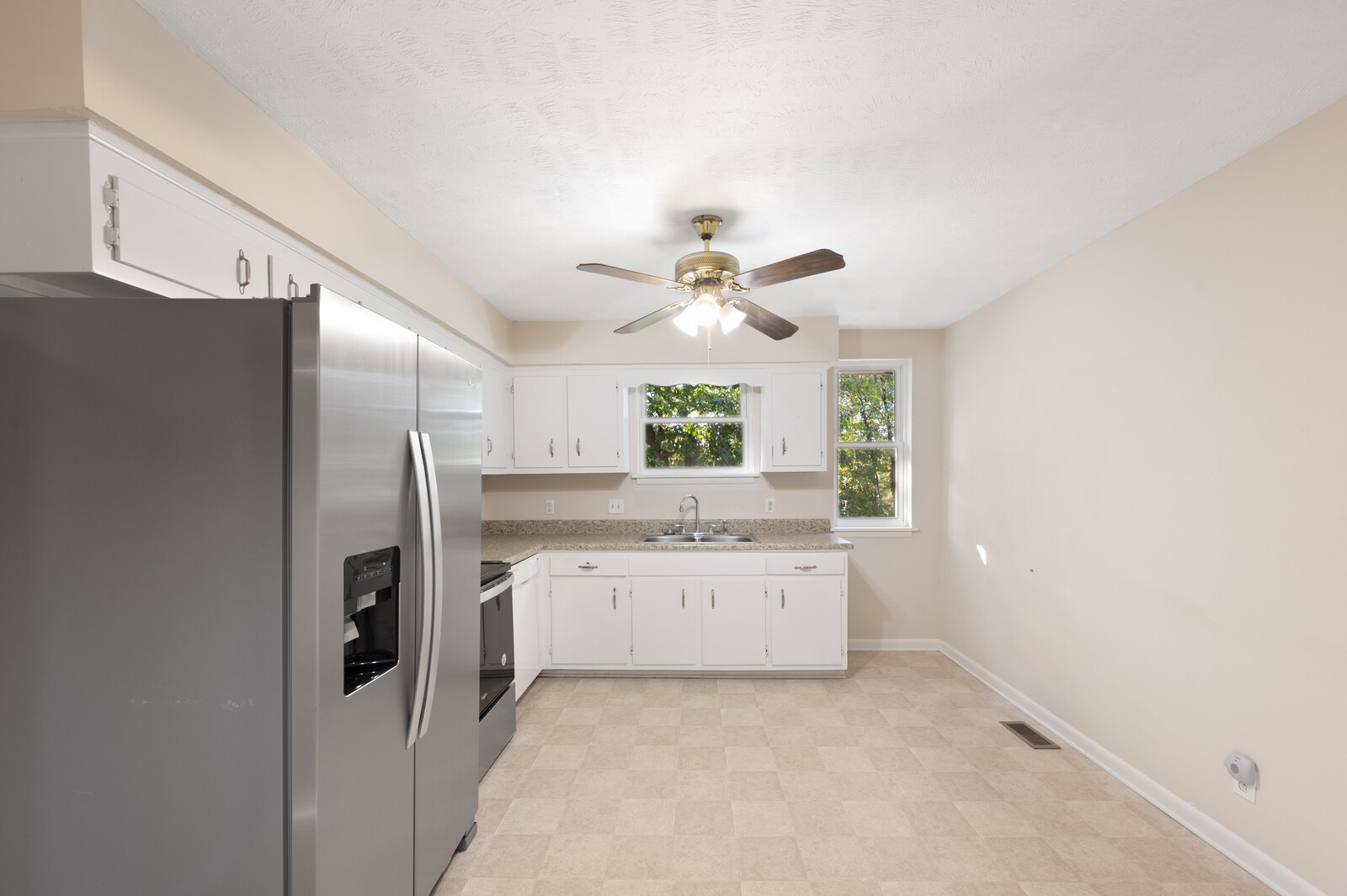 2911 Anderson Road Nashville, TN 37217 - Photo 3 of 14 a kitchen with stainless steel appliances a refrigerator and a sink