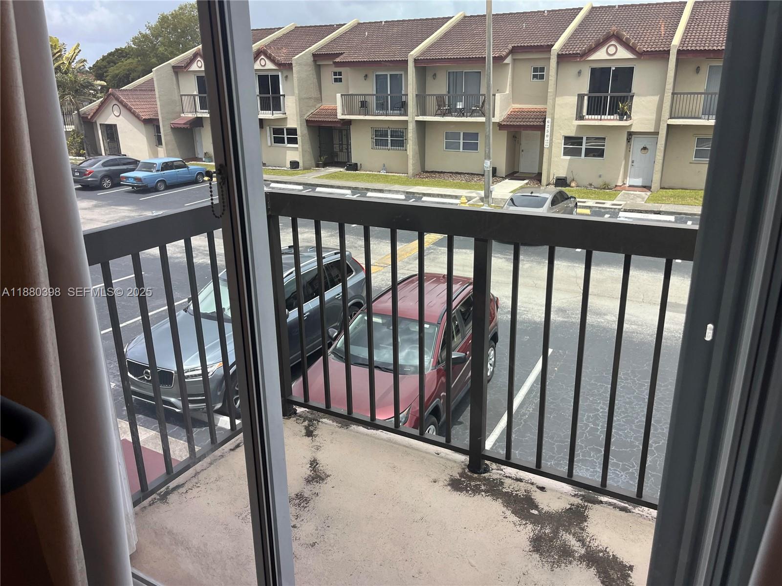 6275 Southwest 130th Avenue, Unit 805 Miami, FL 33183 - Photo 11 of 12 a view of building from a balcony