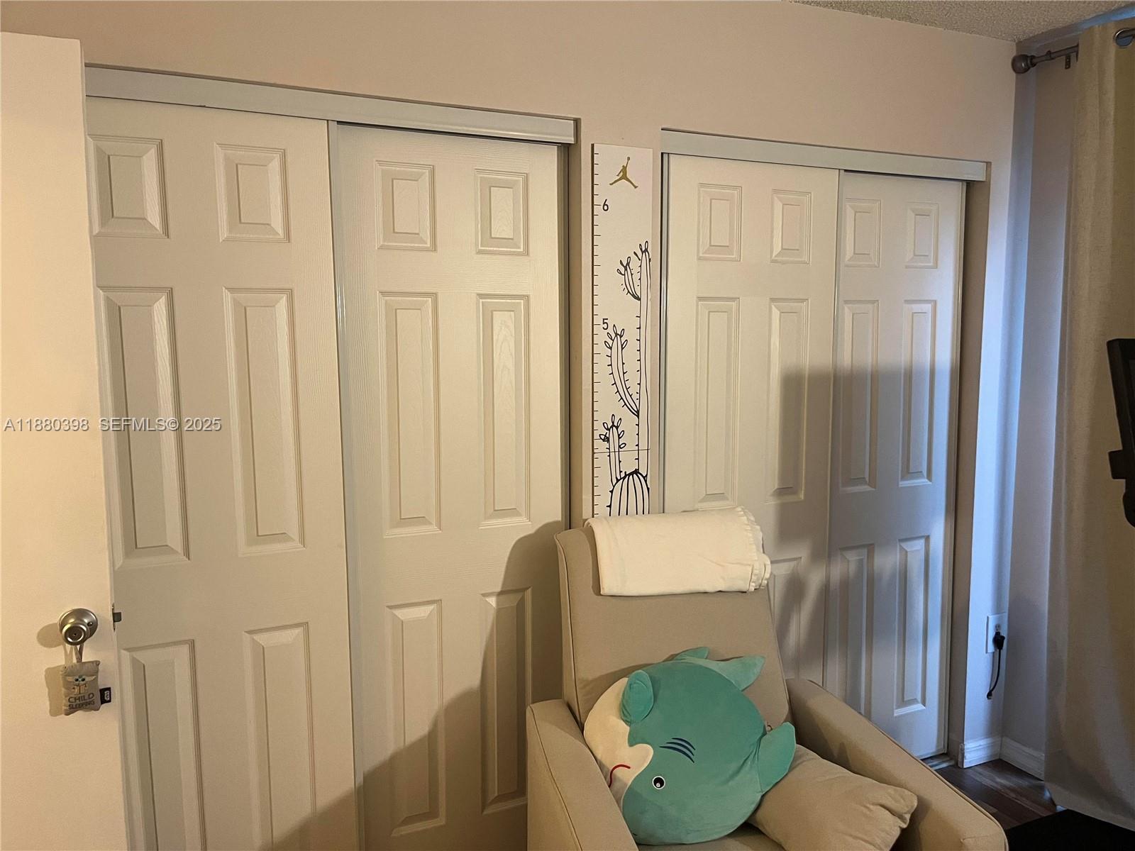 6275 Southwest 130th Avenue, Unit 805 Miami, FL 33183 - Photo 6 of 12 a view of a livingroom with furniture and stairs