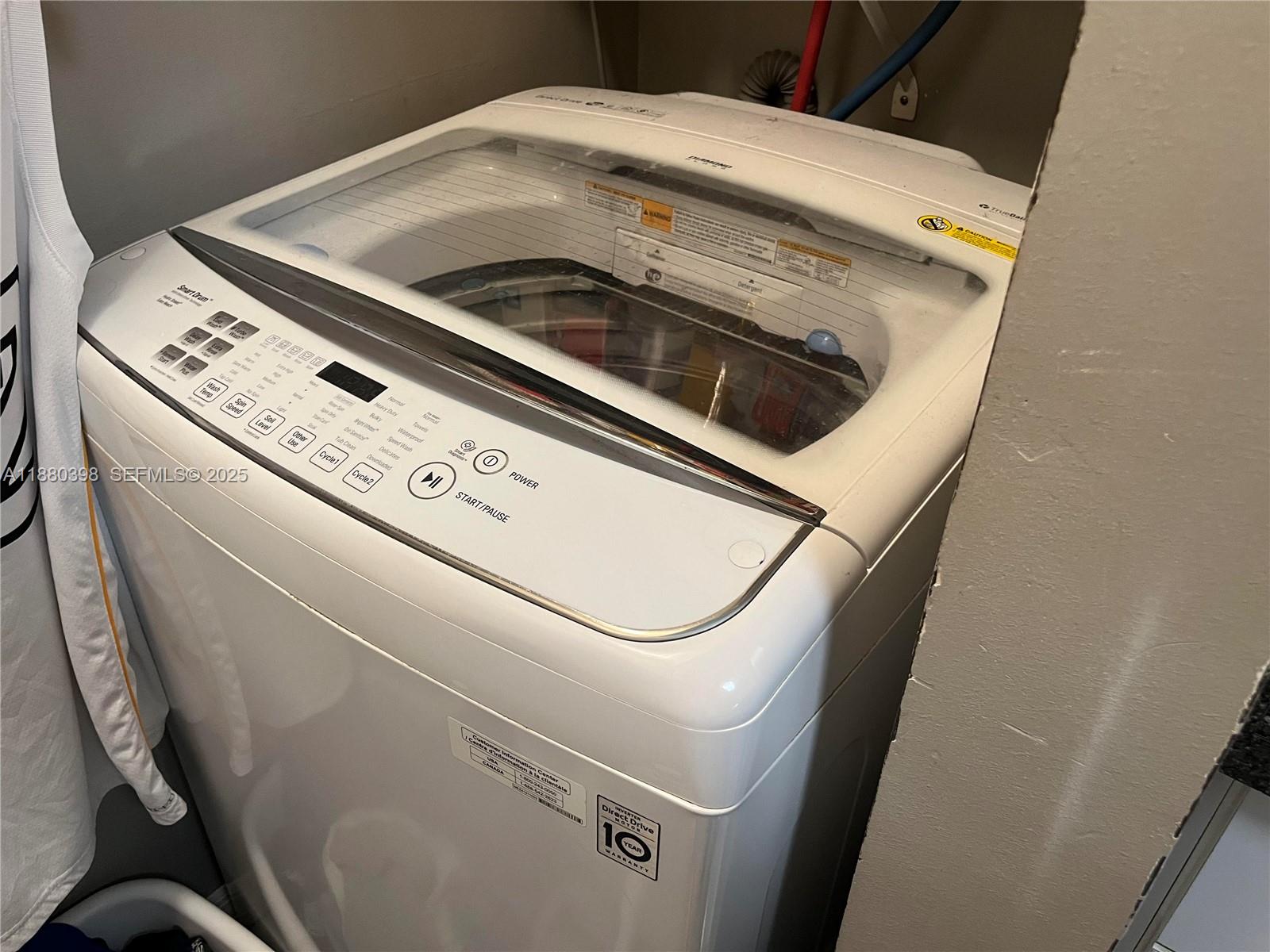 6275 Southwest 130th Avenue, Unit 805 Miami, FL 33183 - Photo 10 of 12 a close up view of washer and dryer