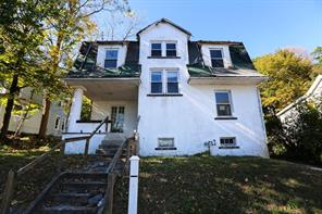 29 Beacon Street Middletown, NY 10940 - Photo 1 of 1 a front view of a house with garden