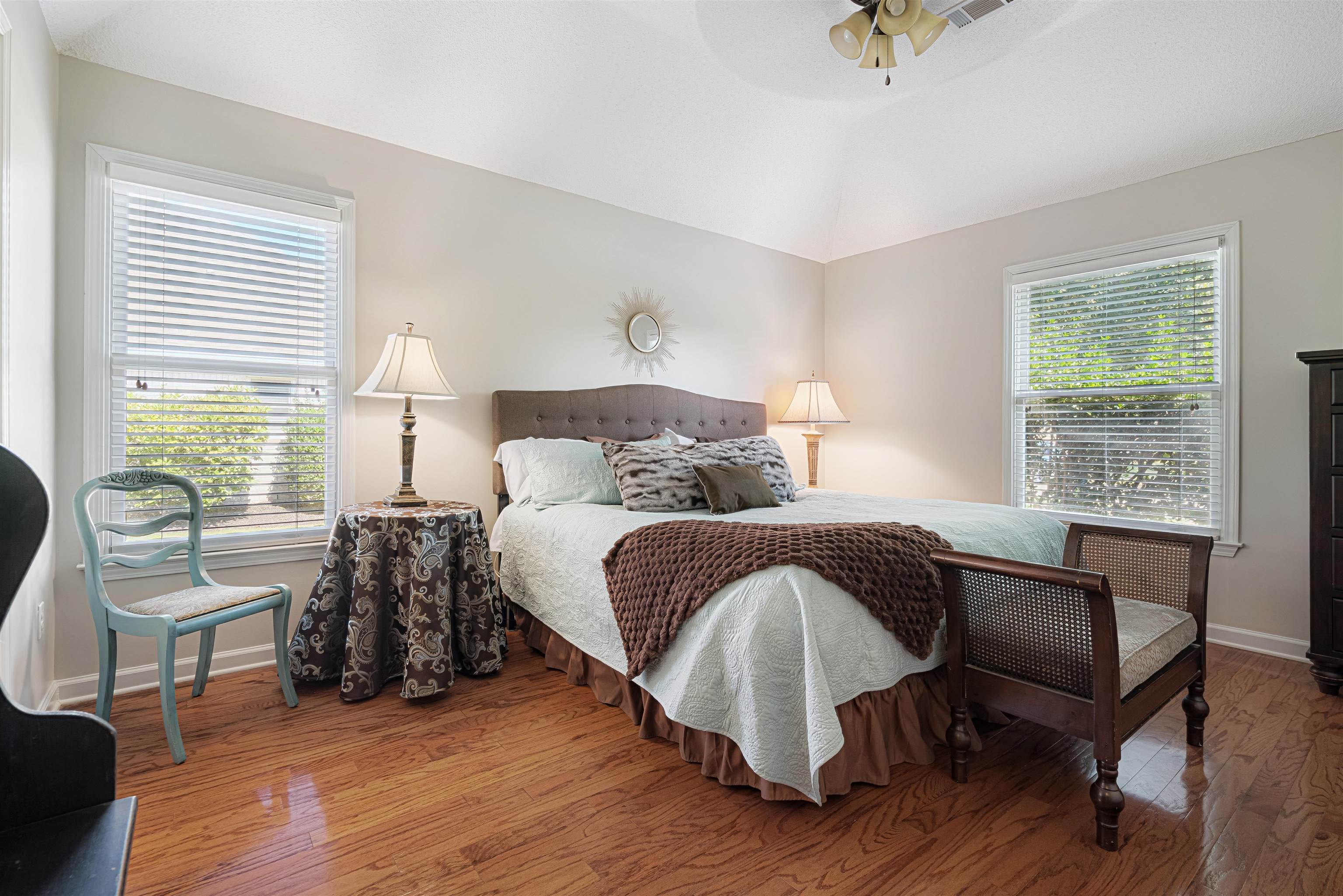 1337 Hunters Mill Trail Collierville, TN 38017 - Photo 13 of 25 a bedroom with a bed and wooden floor