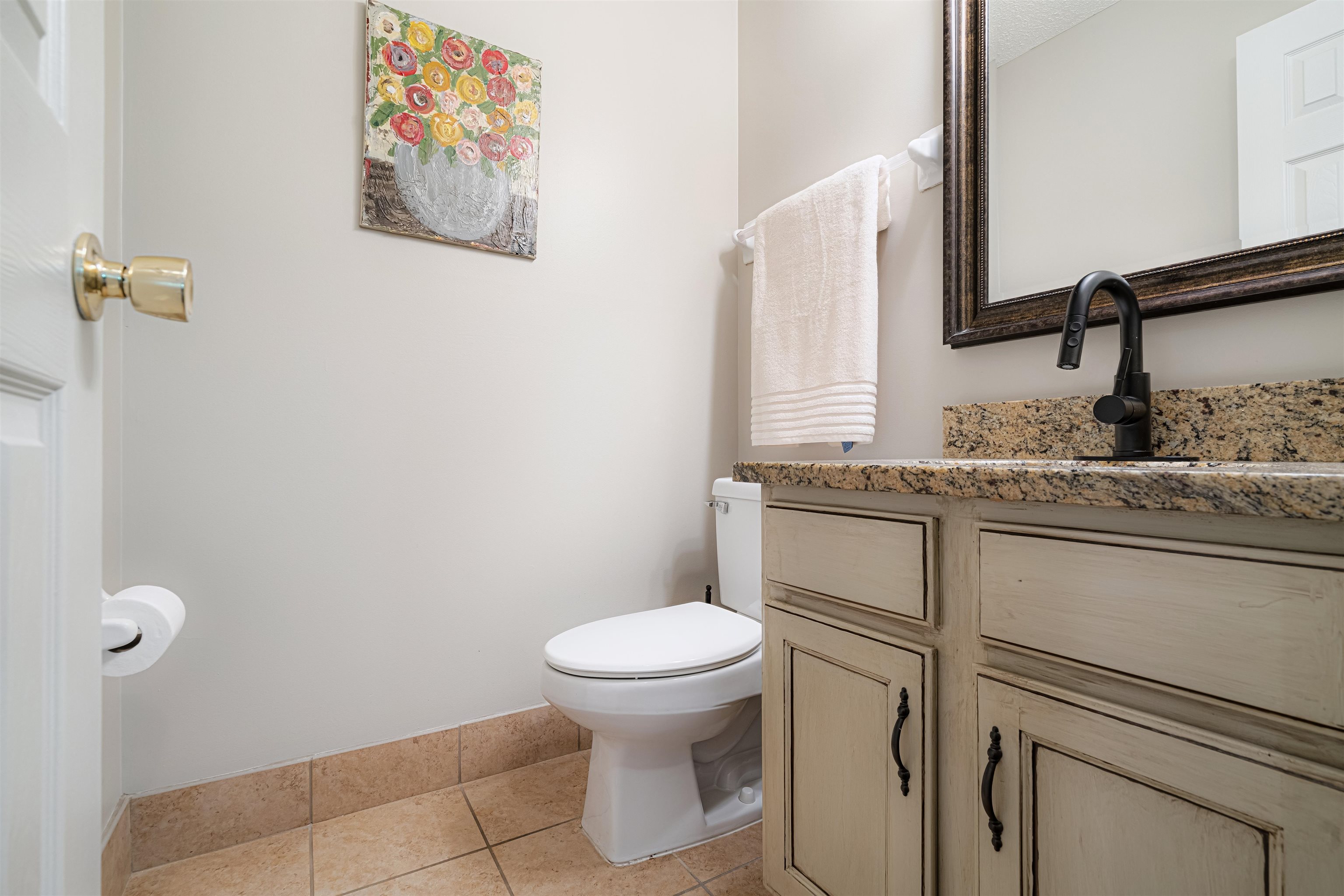 1337 Hunters Mill Trail Collierville, TN 38017 - Photo 16 of 25 a bathroom with a granite countertop toilet and a sink