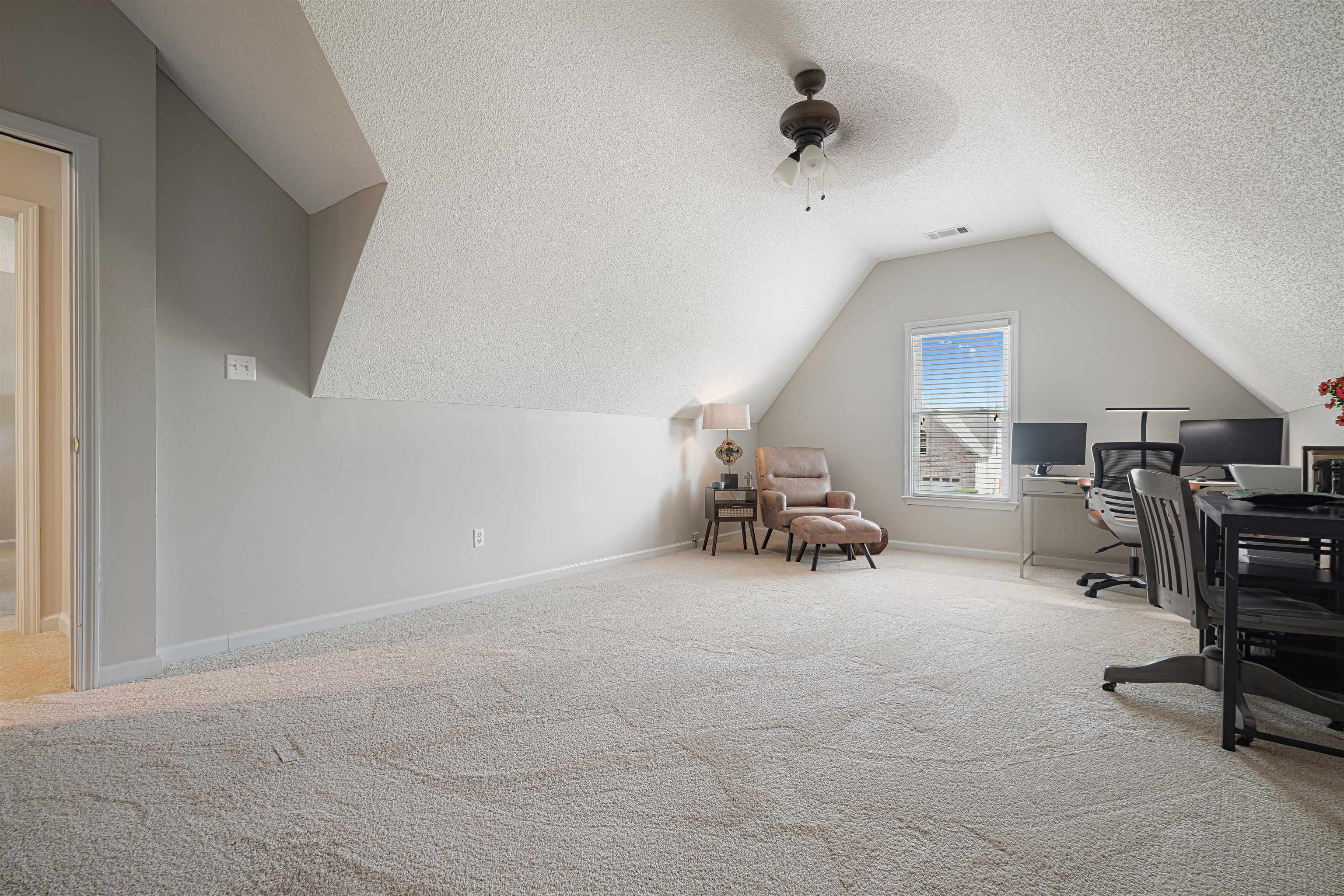 1337 Hunters Mill Trail Collierville, TN 38017 - Photo 19 of 25 a view of a room with furniture and a window