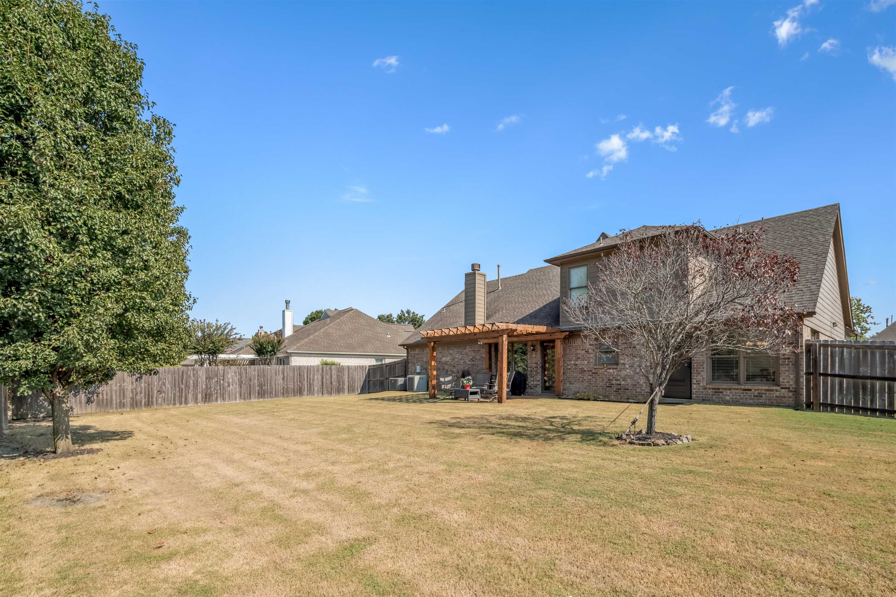1337 Hunters Mill Trail Collierville, TN 38017 - Photo 23 of 25 a front view of a house with a yard