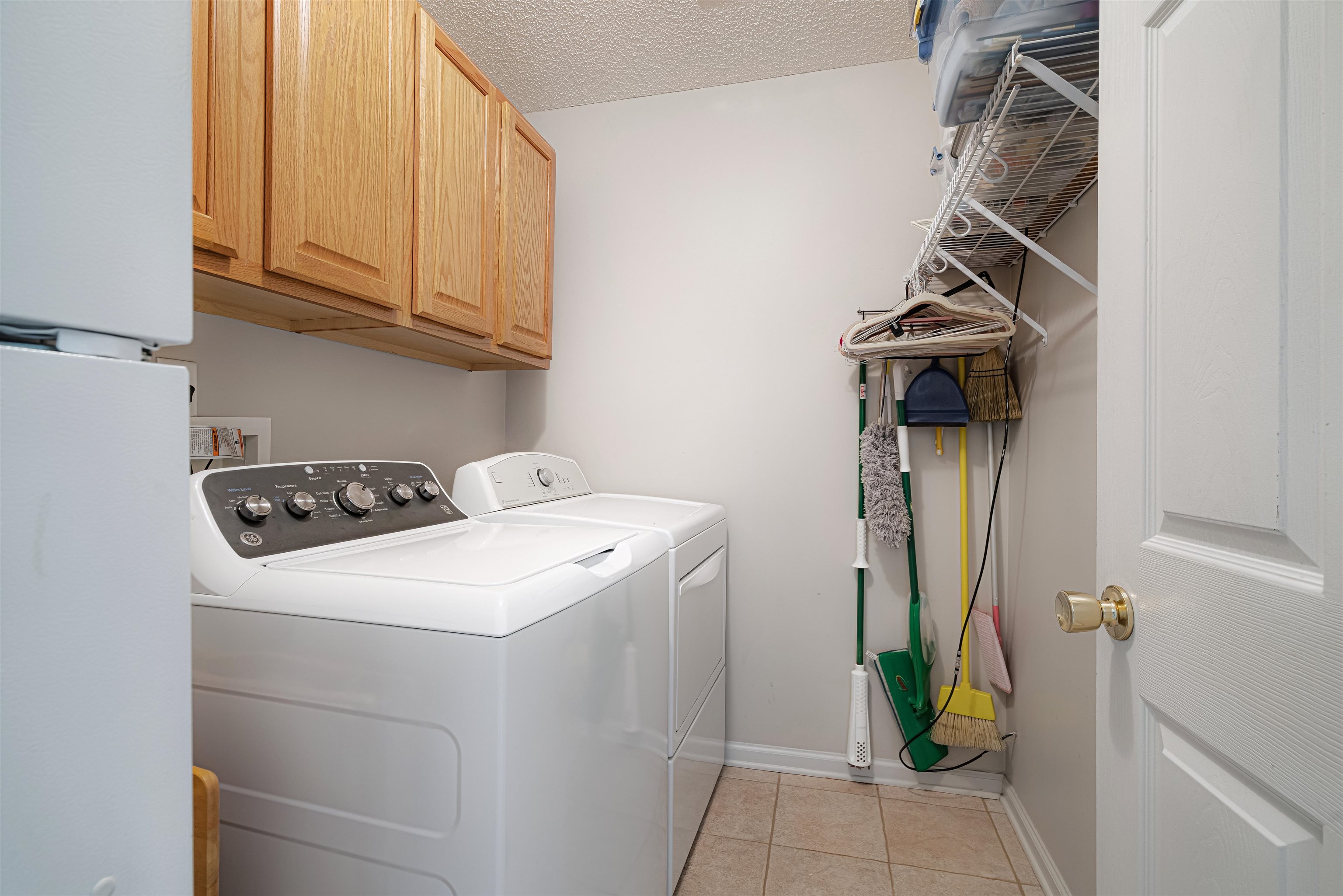 1337 Hunters Mill Trail Collierville, TN 38017 - Photo 25 of 25 a utility room with dryer and washer