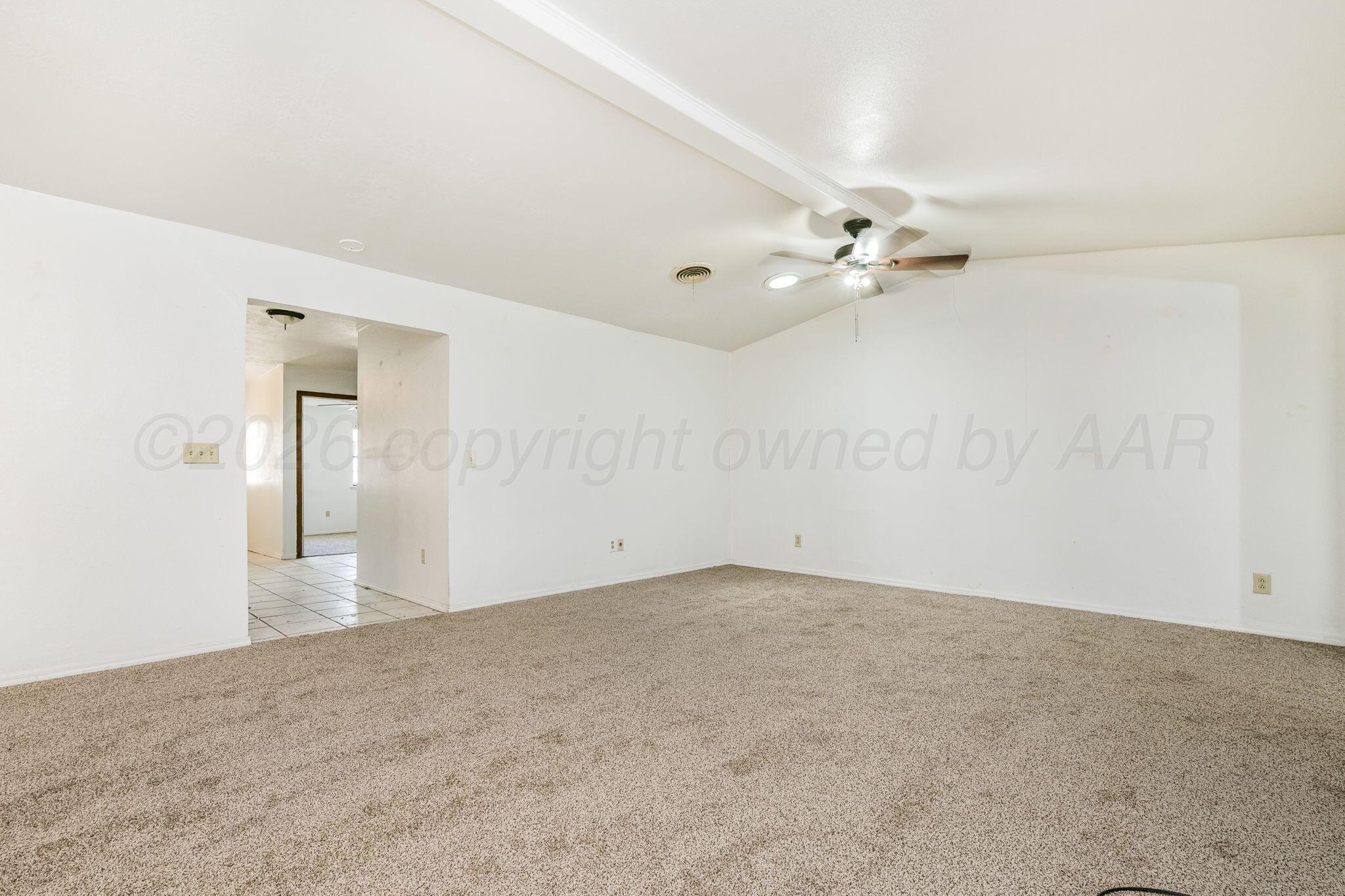 3103 Southwest 27th Avenue Amarillo, TX 79109 - Photo 7 of 21 wooden floor in an empty room