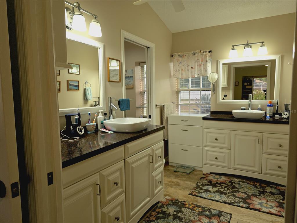 10085 Blackburn Street Spring Hill, FL 34608 - Photo 12 of 25 a kitchen with sink and cabinets