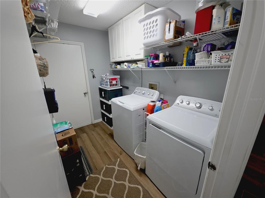 10085 Blackburn Street Spring Hill, FL 34608 - Photo 20 of 25 a utility room with dryer and washer