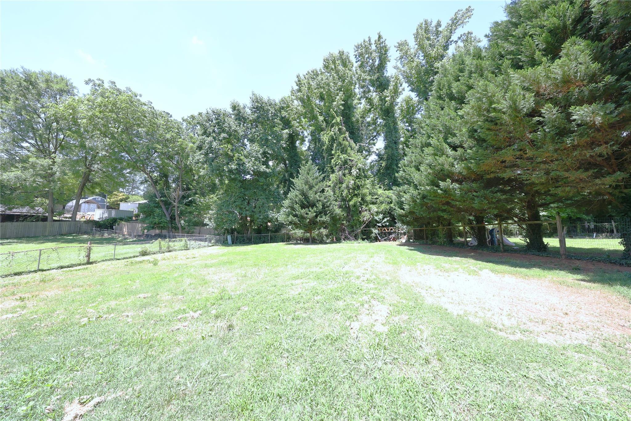 6131 Trotters Ridge Road Charlotte, NC 28227 - Photo 29 of 29 a view of a field with a trees
