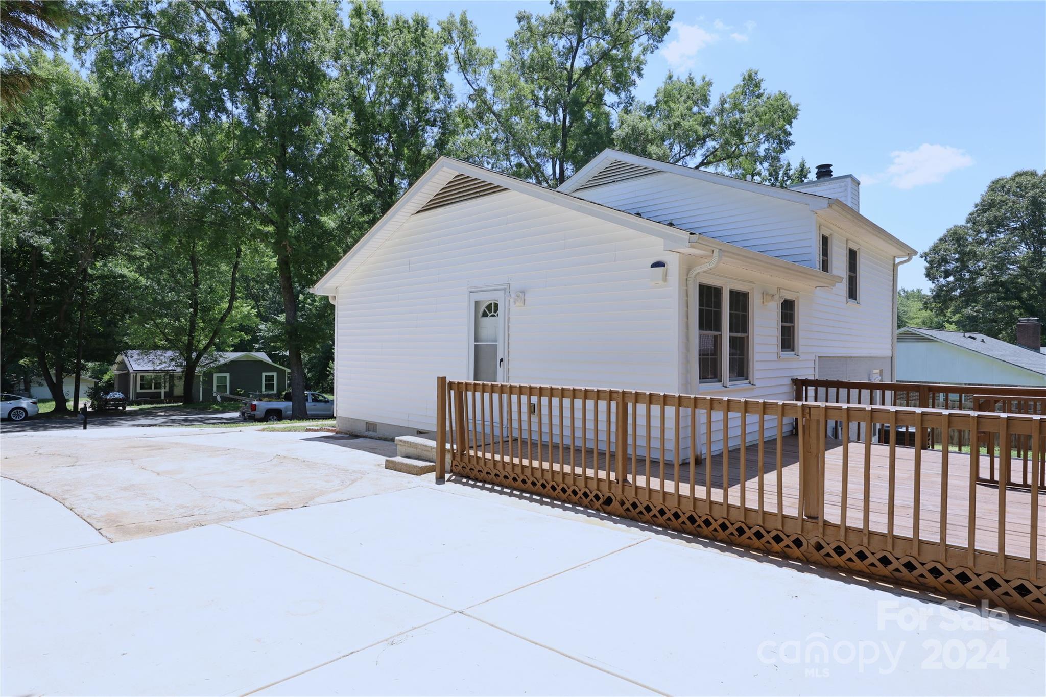 6131 Trotters Ridge Road Charlotte, NC 28227 - Photo 3 of 29 a view of a house with a yard